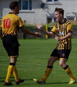 Keir Milliken congratulates Graham Wilson on scoring