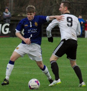 Talbot's Boyd tries to muscle his way through.