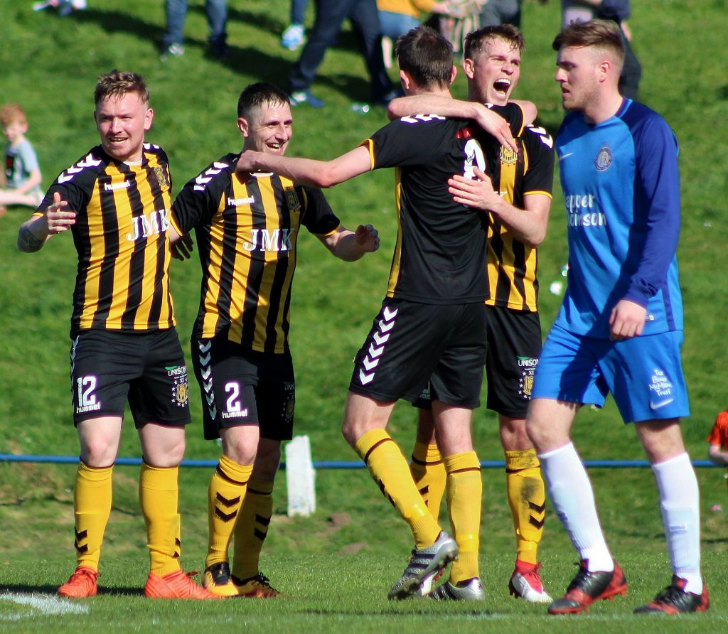 The ref blows for fulltime and the Talbot players begin to celebrate reaching ANOTHER Scottish